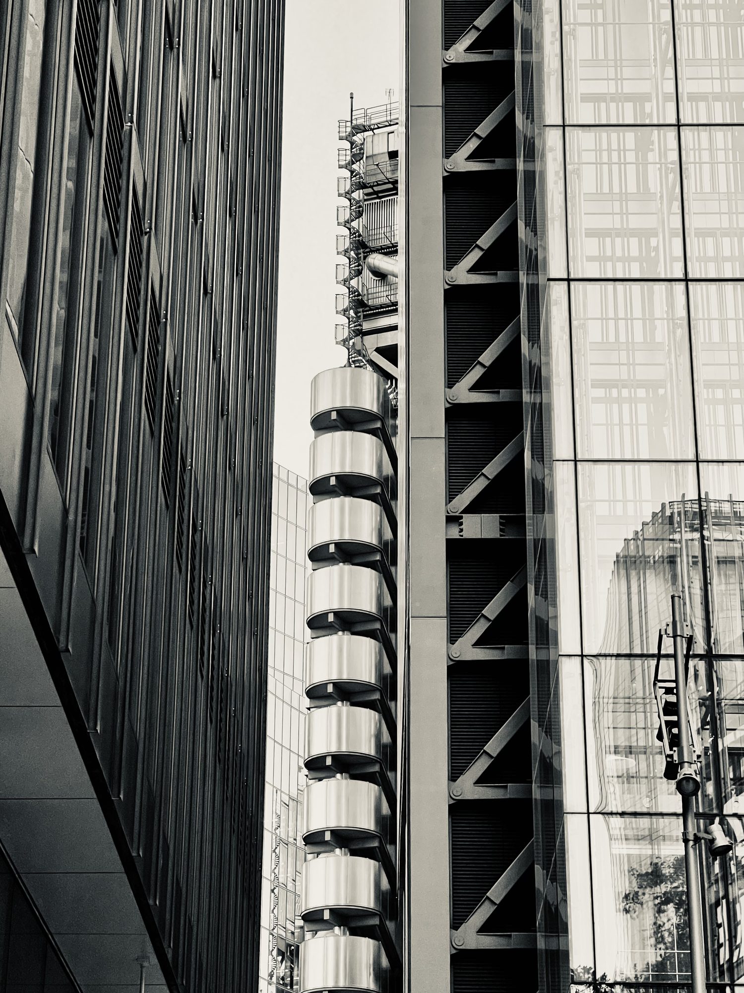 London commercial facade detail: glass, steel and plant